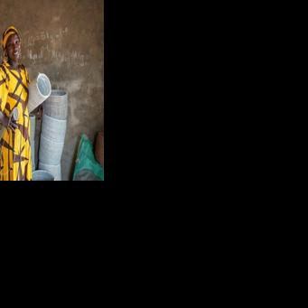 Khady Sene, 35, who stands with a shipment of baskets destined for Denmark, says she has been weaving 'since I was born'