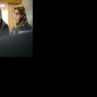 Iran's ambassador Ali Bahreini (C) told the Human Rights Council that his country was under 'reckless military aggression'