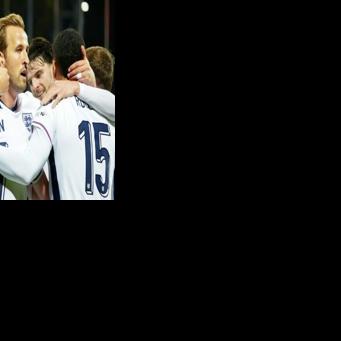 Harry Kane (C) scored twice as England won 5-0 in Latvia to clinch qualification for next year's World Cup