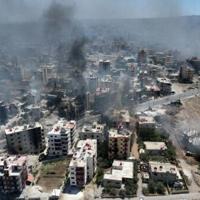 Smoke rises over Sweida as AFP correspondents report gunfire and explosions in several neighbourhoods despite a ceasefire ordered by Syria's Islamist-led government
