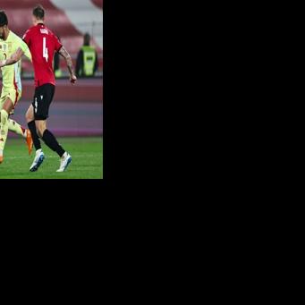 Spain's Ferran Torres (L) put the game to bed 10 minutes before the break by converting a cross from Mikel Oyarzabal