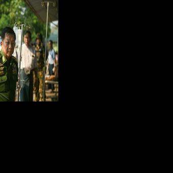 Myanmar's military chief Min Aung Hlaing (C) in Naypyidaw on March 28, 2025, after an earthquake in central Myanmar