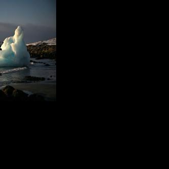 An ice block on the shore in Nuuk, western Greenland. The Antarctic and Greenland ice sheets have both lost significant mass