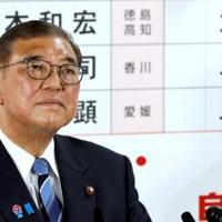 Japan's Prime Minister Shigeru Ishiba addresses the media after his coalition lost its upper house majority in elections