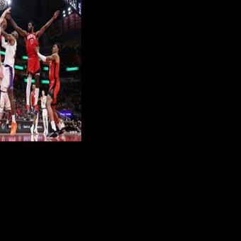 Houston's Alperen Sengun and Tari Eason blocks a shot from LeBron James in the Rockets' NBA playoff victory over the Los Angeles Lakers