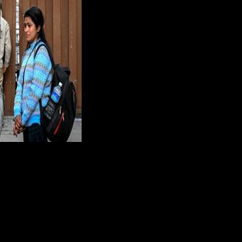 Those left behind: a relative of Nepali migrant worker Rudra Bahadur Kami sheds a tear as his body is repatriated