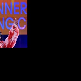 Nemo holding the Eurovision 2024 trophy in Malmo, Sweden