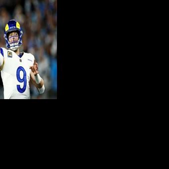 Fighting through a hand injury that appeared to dramatically impair his passing, quarterback Matthew Stafford threw a game-saving touchdown in the final minute to spare the Los Angeles Rams' blushes and advance to the divisional round