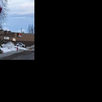 Flowers are placed near Tumbler Ridge Secondary school two days after the rural community experienced one of Canada's deadliest shootings