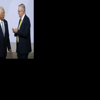 European Council President Antonio Costa -- here flanked by European Commission President Ursula von der Leyen and Australian Prime Minister Anthony Albanese -- said all EU leaders would meet to further discuss Trump's plan on Monday