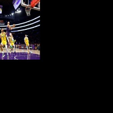 Phoenix Suns forward Dillon Brooks shoots during his team's rout of the Los Angeles Lakers