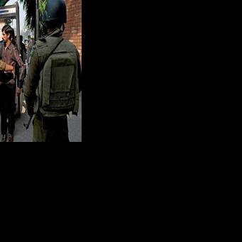 Residents in Pakistan's capital Islamabad faced tightening security after a suicide bombing that killed at least 12 people