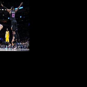 Los Angeles Lakers star Luka Doncic takes a shot over Bam Adebayo in the Lakers' NBA victory over the Miami Heat