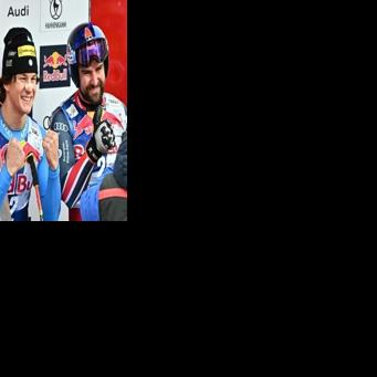 (L-R) Switzerland's Marco Odermatt, Italy's Giovanni Franzoni and France's Maxence Muzaton