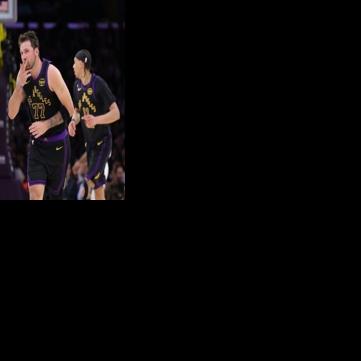 Luka Doncic of the Los Angeles Lakers reacts after making a three-pointer against the Cleveland Cavaliers