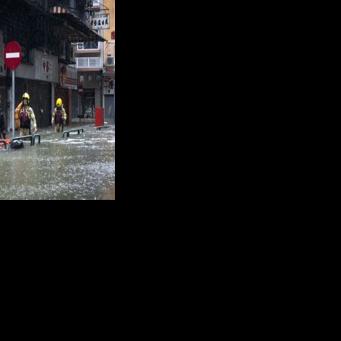 Rescue teams looked for people in need of help in Macau during Typhoon Ragasa