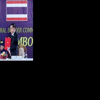 Cambodian Defence Minister Tea Seiha (L) and his Thai counterpart Nattaphon Narkphanit said they had agreed an 'immediate' ceasefire after weeks of deadly border clashes