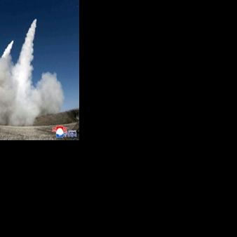 This picture taken on January 27, 2026 and released by North Korea's official Korean Central News Agency (KCNA) on January 28, 2026 shows a test firing of the renewed large-caliber rocket launcher system