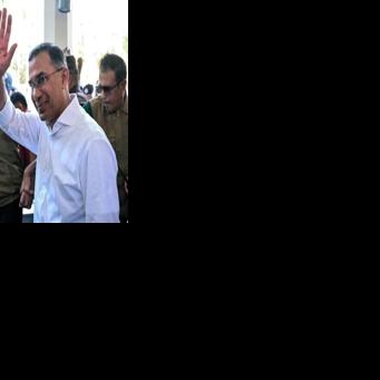 Bangladesh Nationalist Party (BNP) chairman Tarique Rahman (R) after addressing a press conference in Dhaka on February 14, 2026