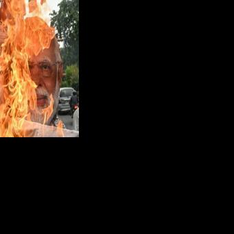 Opposition activists burned an effigy of US President Donald Trump and Indian Prime Minister Narendra Modi earlier this month as negotiations took place under a cloud of US tariffs