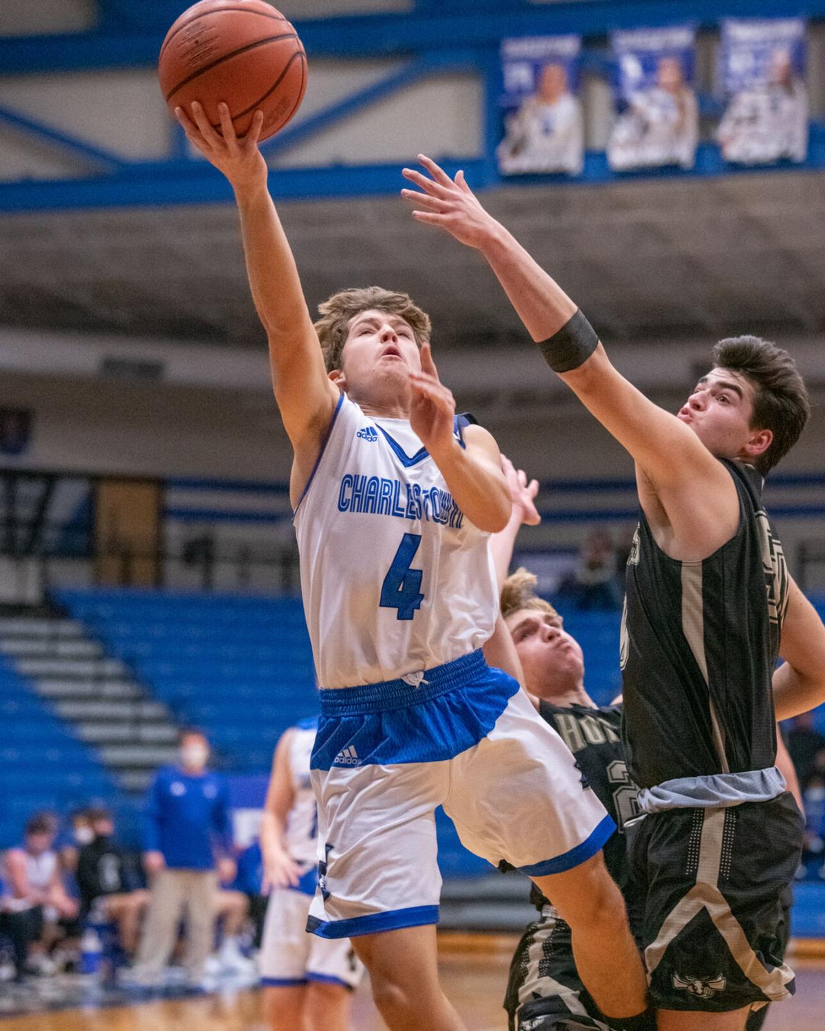 PHOTO GALLERY Henryville at Charlestown boys' basketball Multimedia