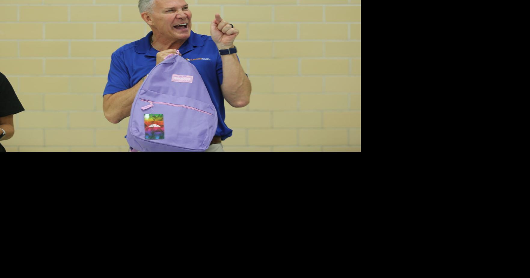 Social services advocates pack backpacks for youth in foster care ...