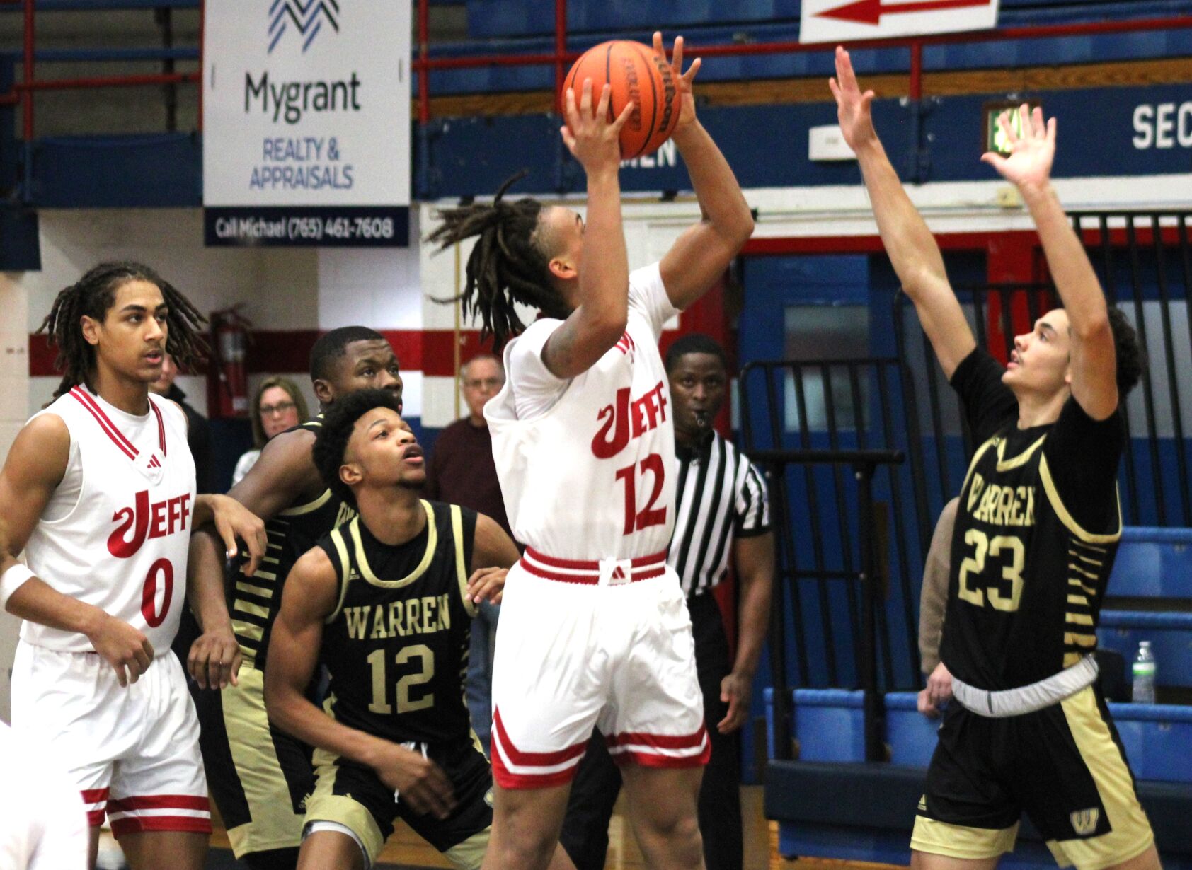 Jeffersonville Red Devils Stage Comeback to Beat Warren Central 64-59 in Phil Cox Memorial Holiday Tournament
