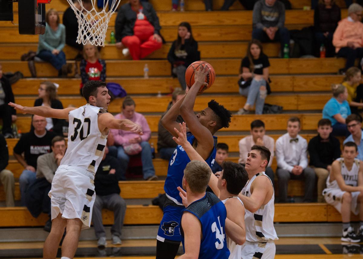 BOYS' BASKETBALL Charlestown comes through with first win at