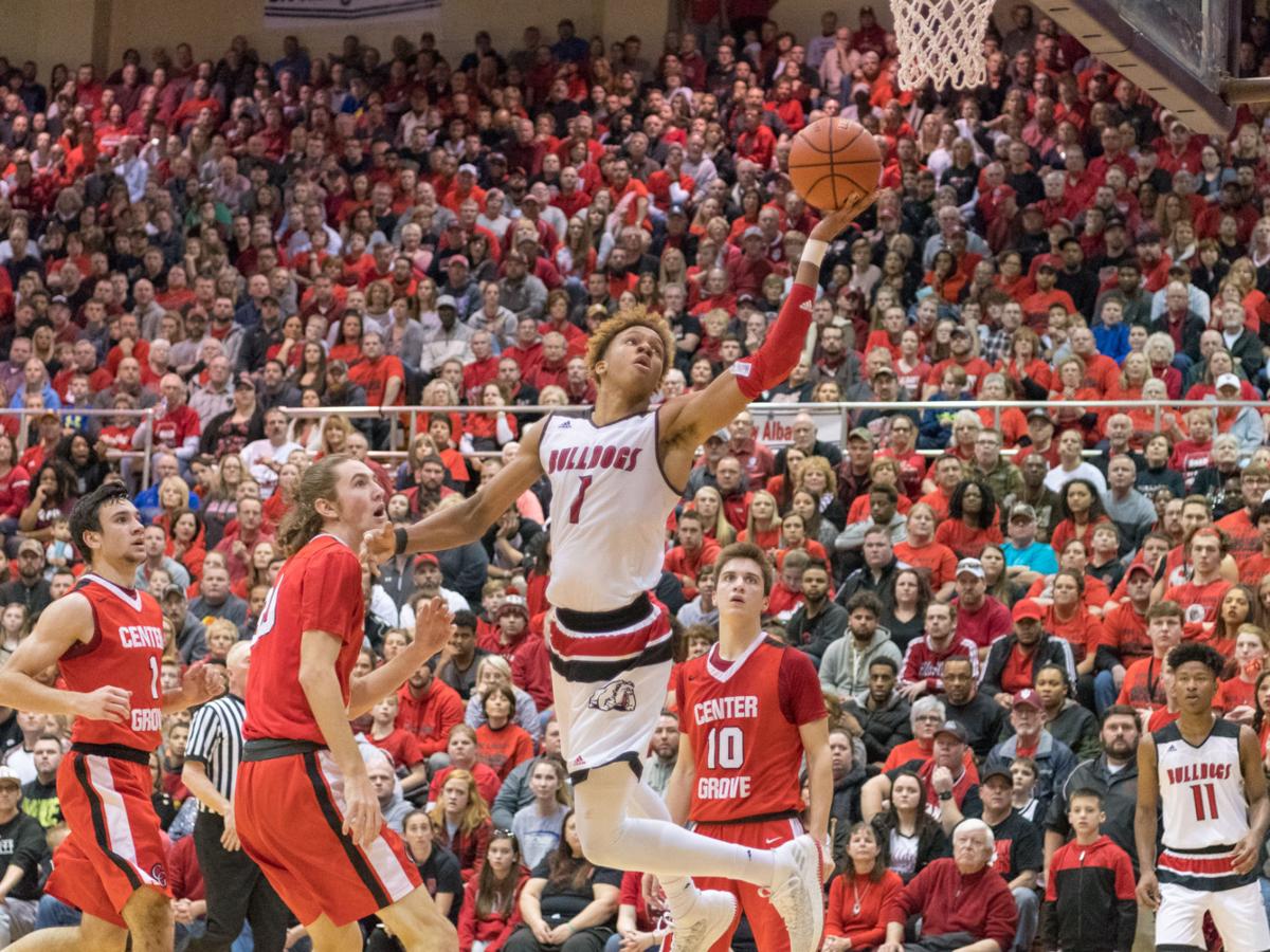 Boys Basketball New Albany Outlasts Center Grove For Regional