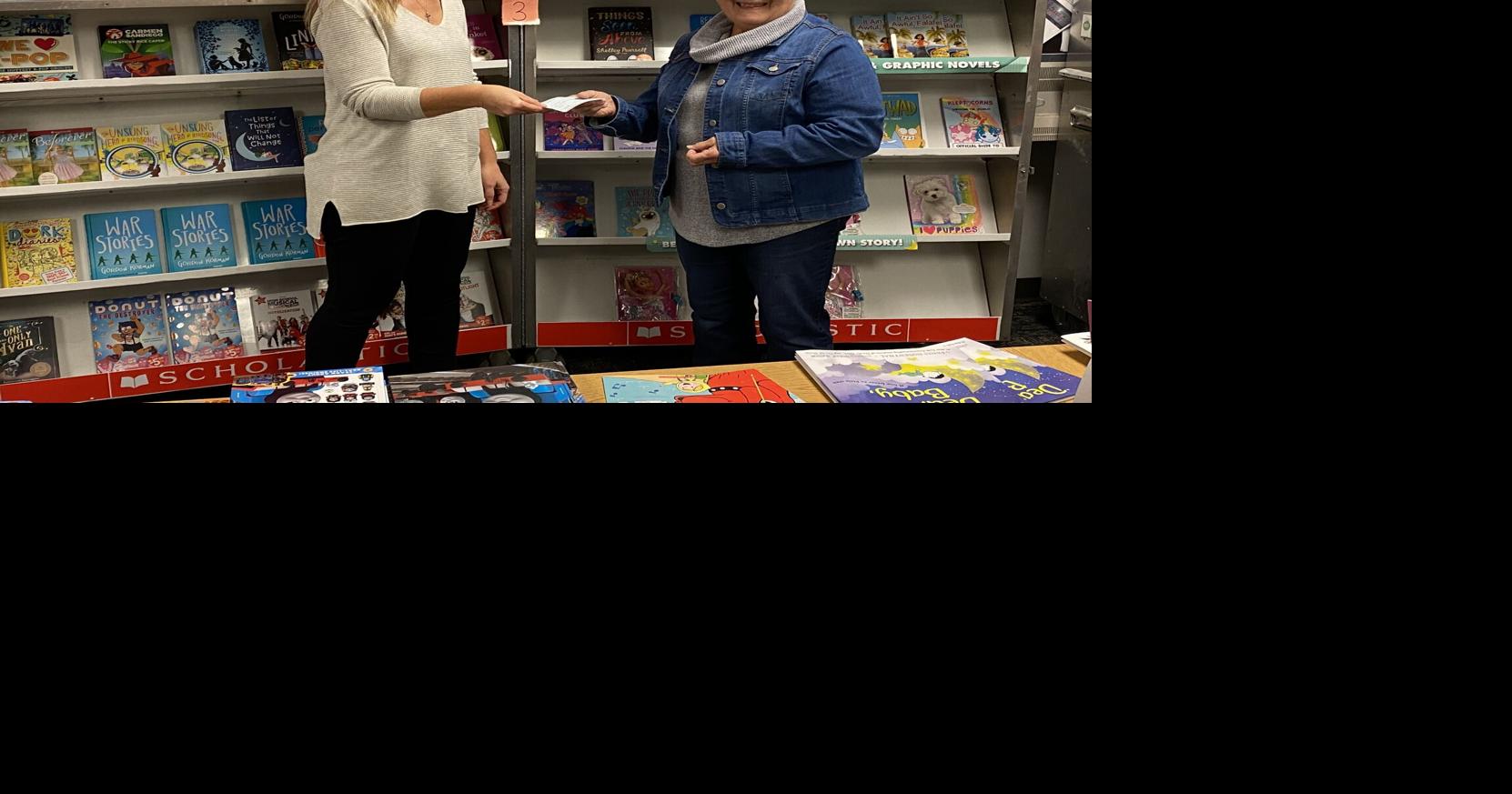 Garden Club donation to Henryville Elementary library News