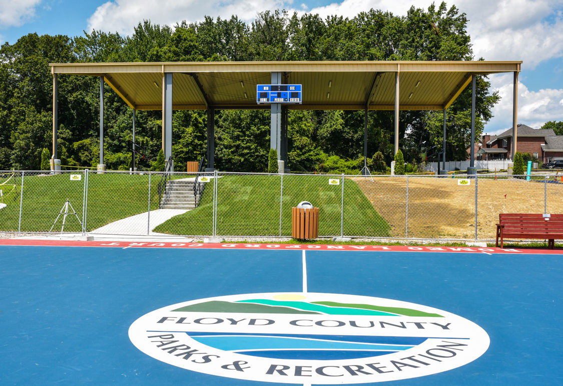 ONE OF A KIND Local businessman funds park's covered basketball court