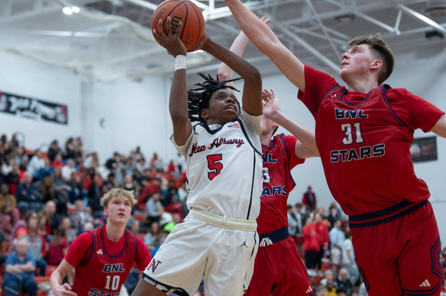 New Albany Beats Bedford North Lawrence 73-71: Lampkins Shines with 19 Points