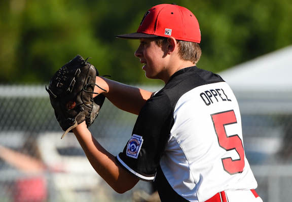 Little League Batter Comforts Pitcher After a Wild Throw