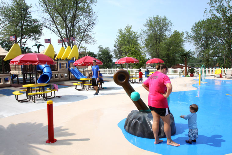 Sprinkler pad, dual roller skating/ice skating rink among features at