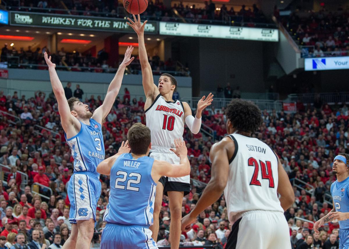 College Basketball Nwora Leads No 11 Louisville Past Short