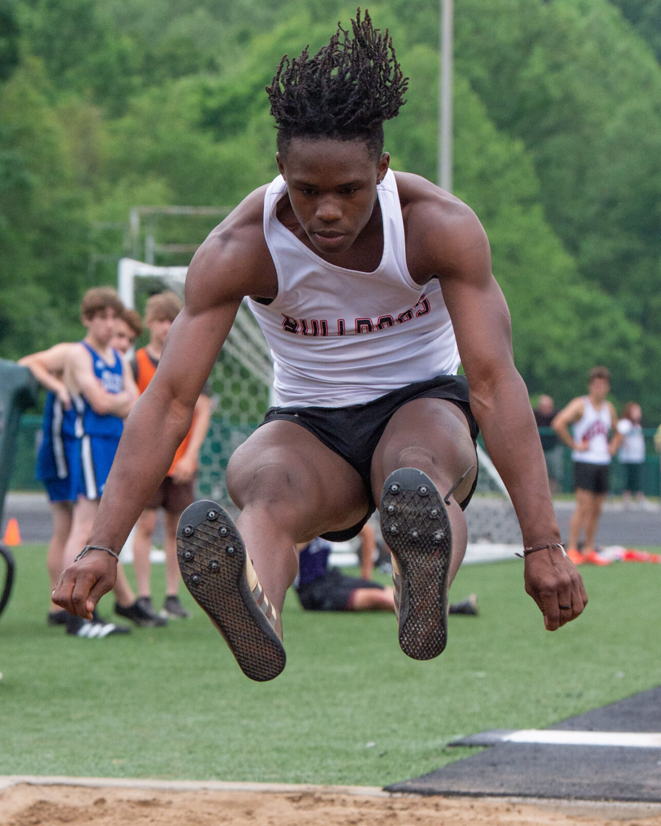 BOYS TRACK FIELD Highlanders claim 3rd regional title Sports