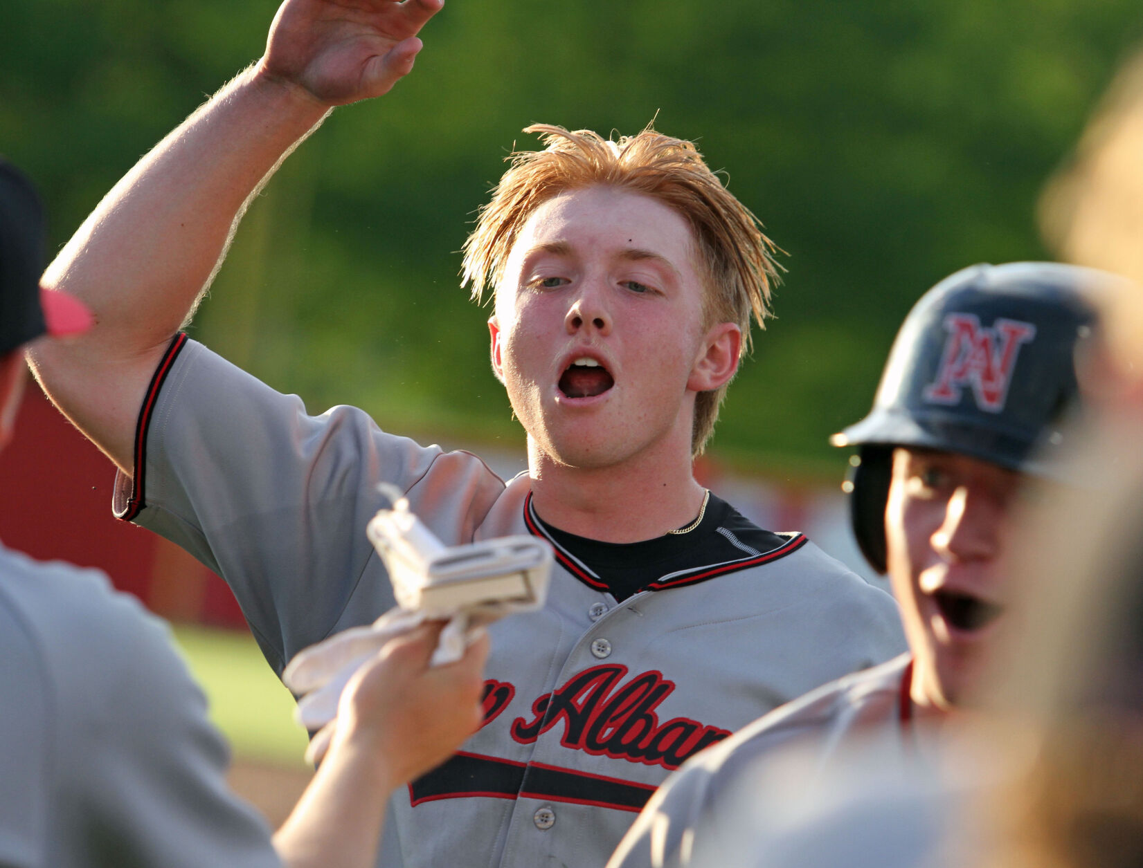 New Albany Bulldogs Top Jeffersonville Red Devils in Extra-Inning Thriller