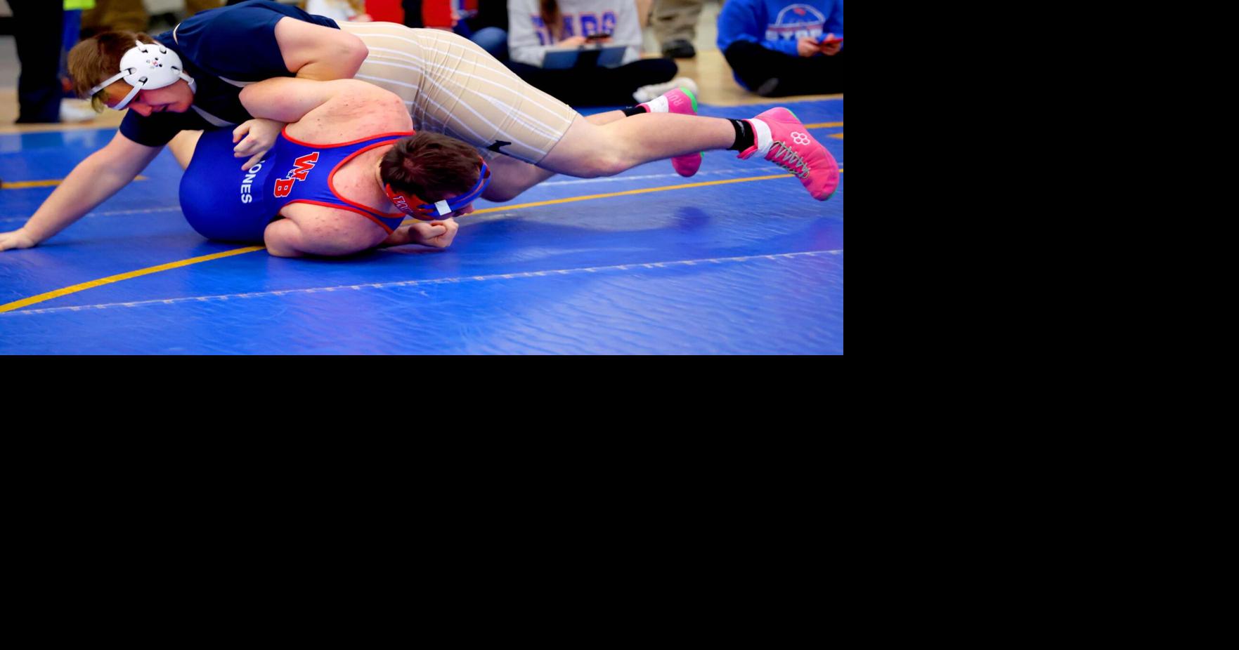 Local athletes competed in boys’ high school wrestling sectionals