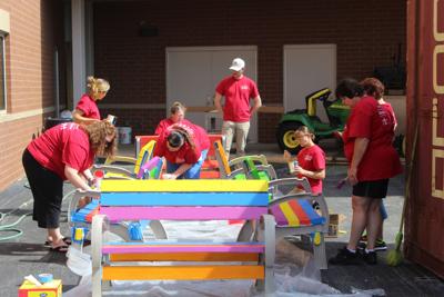 Iu Health Employees Paint Buddy Benches For Twin Lakes Schools