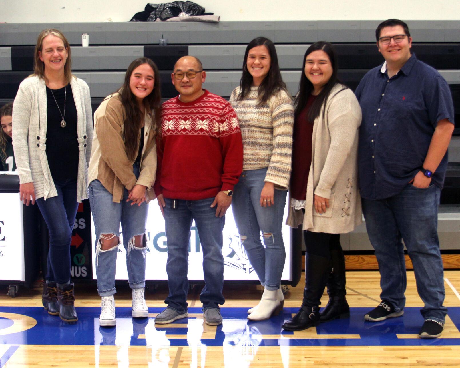 Pho knows photos Longtime photographer honored at DeMotte Christian