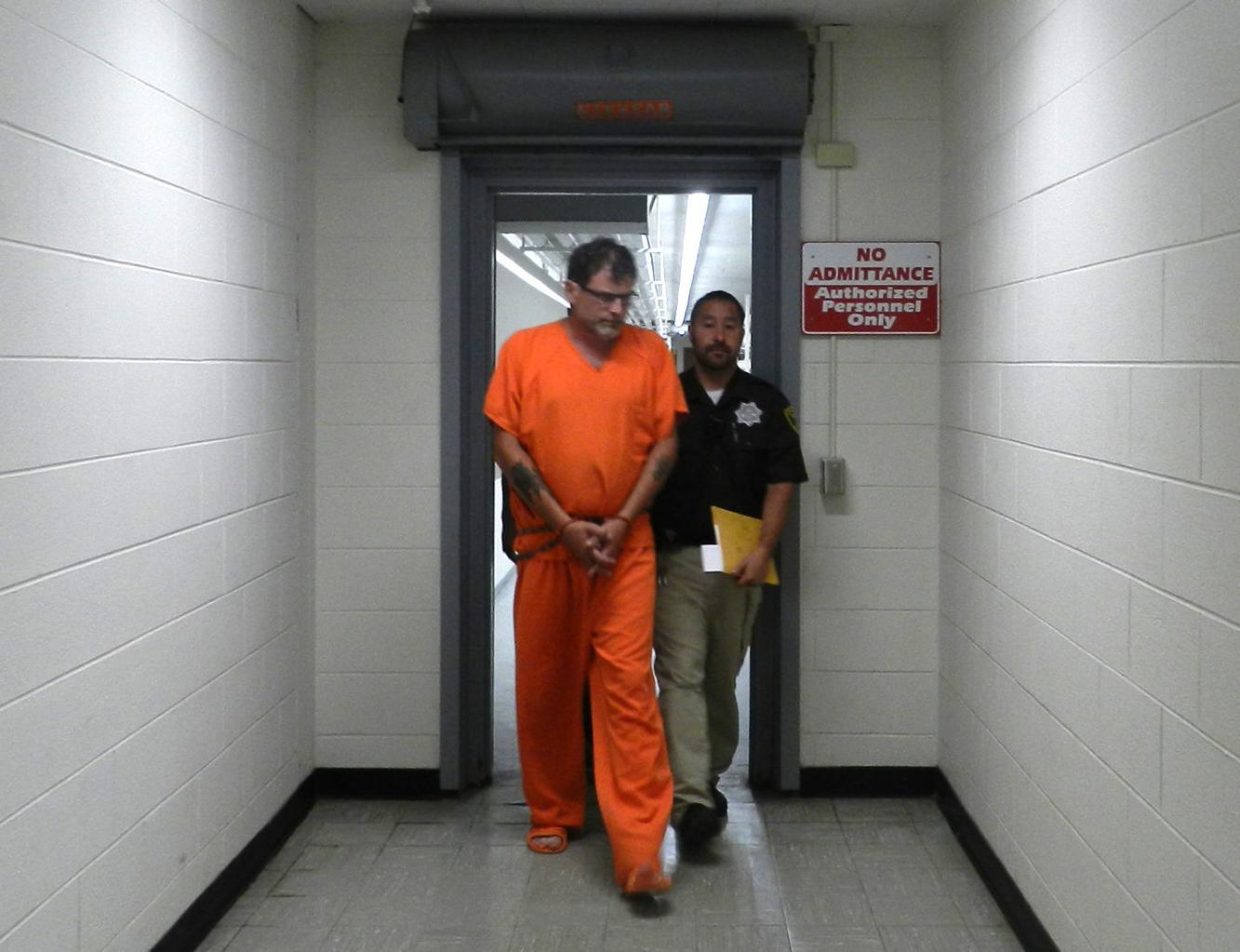 Arthur Jensen taken from county jail to Iroquois County Courthouse