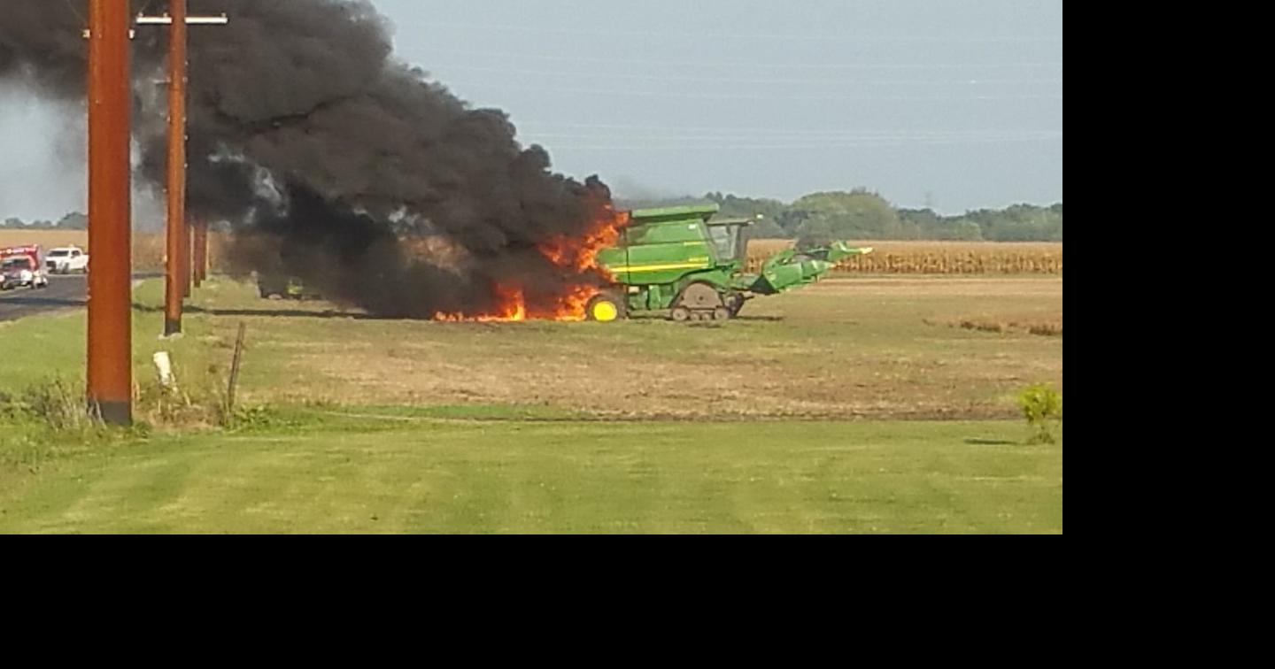 john deere combine on fire