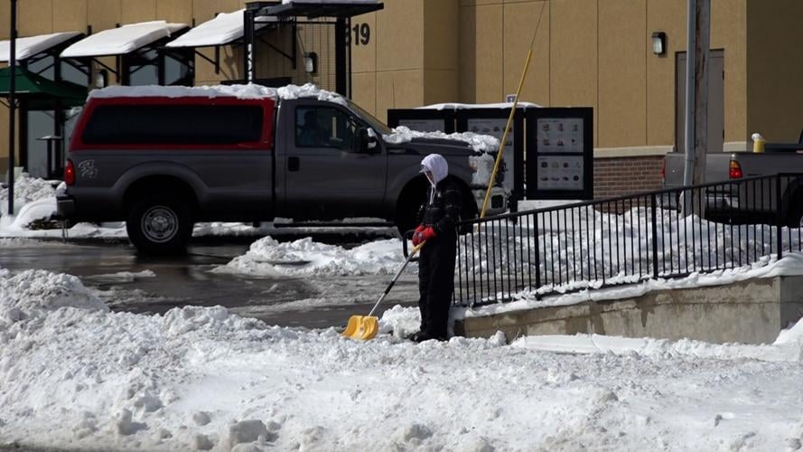 Clean up after snowstorms City Public Works issues downtown snow