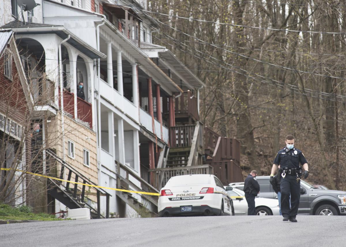 Strangling victim identified; death occurred in same home of murder