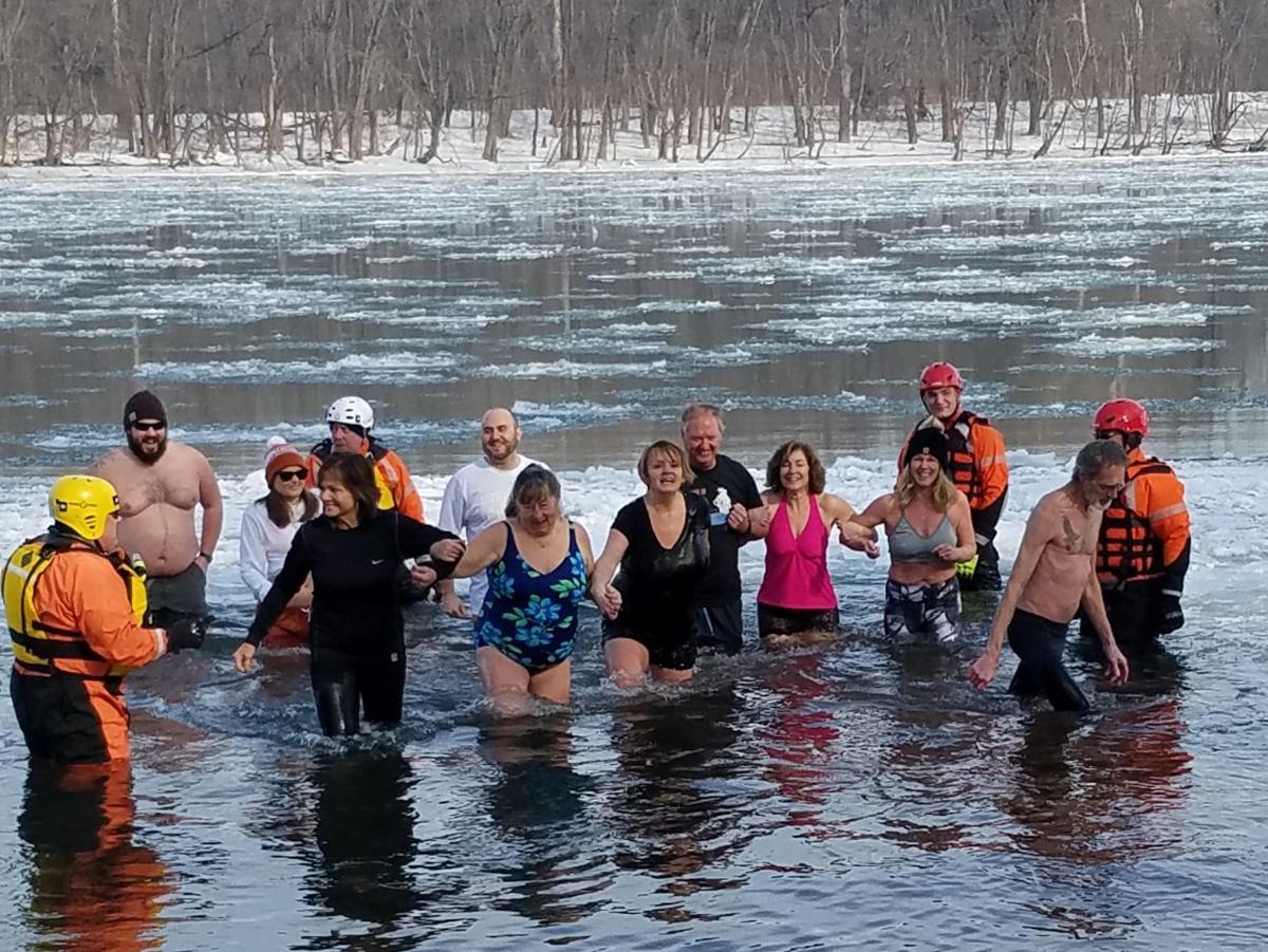 Nearly 100 people take Polar Bear Plunge in Lewisburg Local