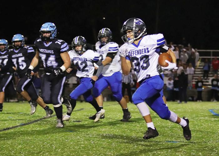H.S. Football Newton celebrates birthday by leading Warrior Run to