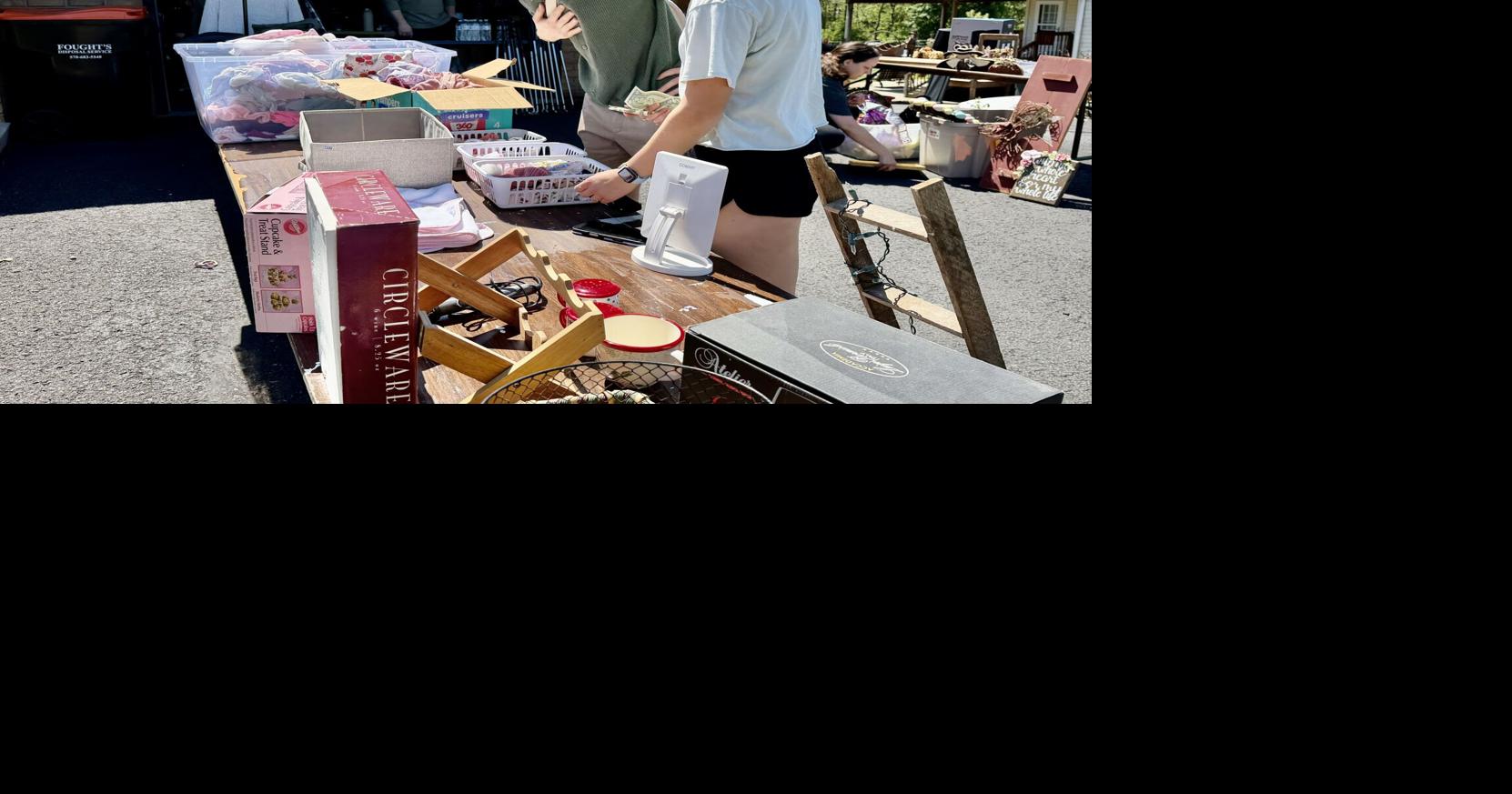 Bargain hunters roam through Ralpho Township for yard sale deals