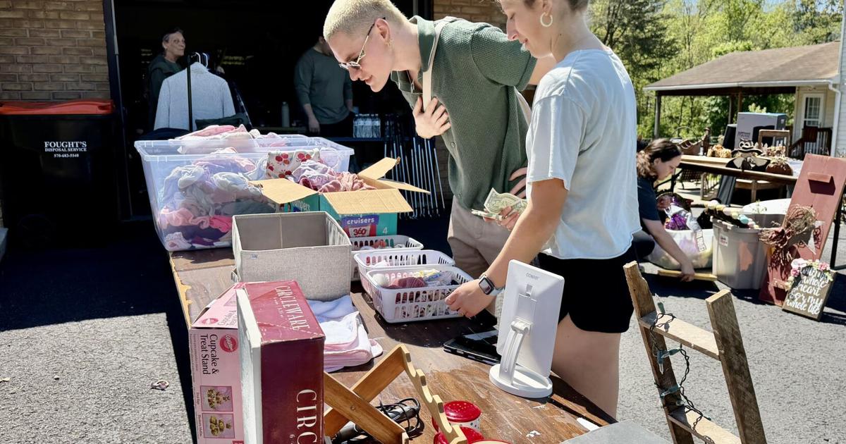 Bargain hunters roam through Ralpho Township for yard sale deals
