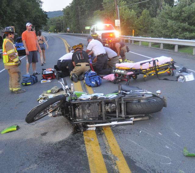 Two injured after motorcycle crash Local