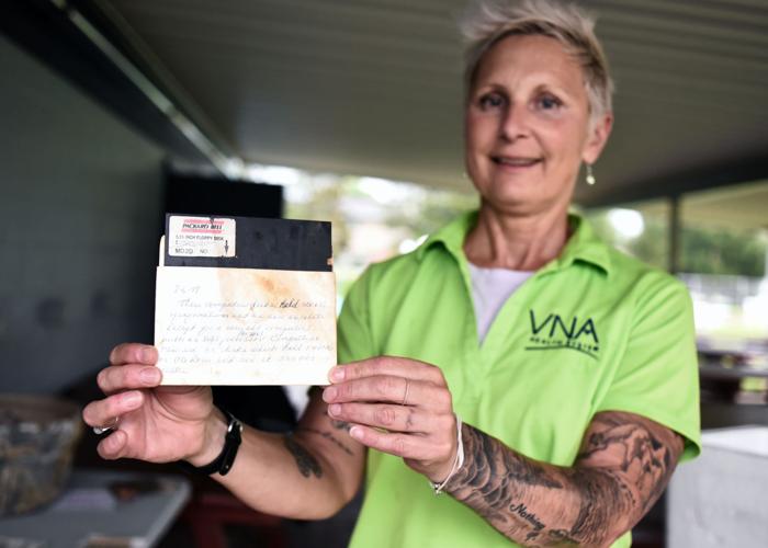 Edgewood Swim Club unearths time capsule as facility celebrates 50 years; rotary phone, floppy